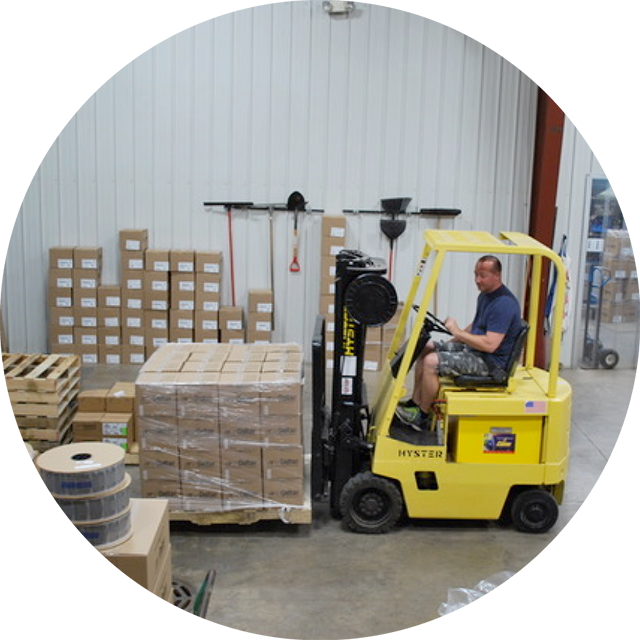 Forklift in packaging warehouse at PQS